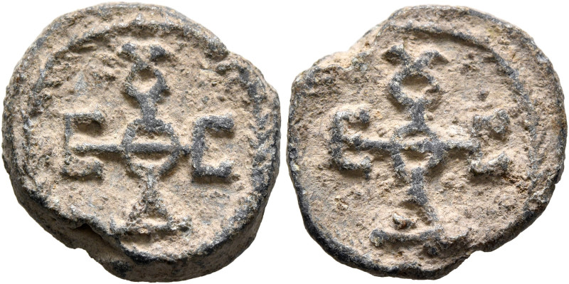 Theodosios, 6th-7th centuries. Seal (Lead, 20 mm, 5.82 g, 12 h). Cruciform monog...