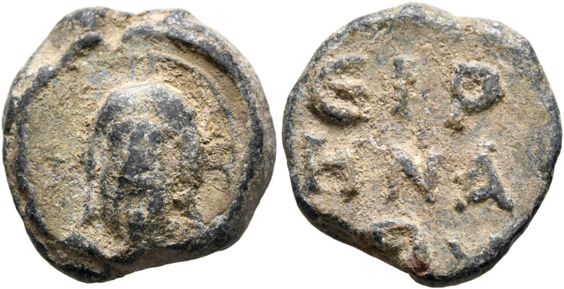 Eirenaios, 6th-7th centuries. Seal (Lead, 18 mm, 6.38 g, 12 h). Head of Christ w...