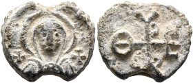 Theodoros, 6th-7th centuries. Seal (Lead, 19 mm, 7.66 g, 12 h). The Mother of God holding infant Christ, both nimbate; cross to her left and right. Re...