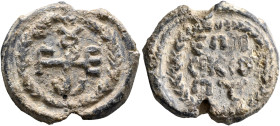 Georgios, bishop, 6th-7th centuries. Seal (Lead, 24 mm, 10.44 g, 12 h). Cruciform ΓEⲰPΓIOV within wreath. Rev. ЄΠI/CKO/Π૪ in three lines, within wreat...