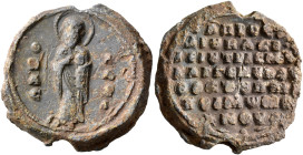 Basileios, protoproedros and parakoimomenos (and doux of Edessa), 1060-1090. Seal (Lead, 24 mm, 12.22 g, 12 h). Θ / R/A/C-I/Λ/Є/I, Saint Basil standin...
