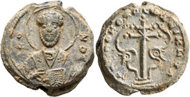 Niketas, 2nd half 10th-1st half of 11th century. Seal (Lead, 24 mm, 12.82 g, 12 h). O / N/I-K/O/Λ Nimbate facing bust of Saint Nicholas, raising his r...