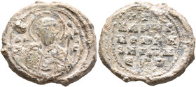 Kamoges, monk and abbot, 1st half 11th century. Seal (Lead, 27 mm, 13.96 g, 12 h). Θ / AN/Π-Є/Λ/A/C Nimbate facing bust of Saint Anpelas, holding a sp...