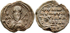 Basileios, 11th century. Seal (Lead, 19 mm, 5.45 g, 12 h). Θ / R/A/C,-Λ/ЄI/O, Nimbate facing bust of Saint Basil, raising his right hand in benedictio...