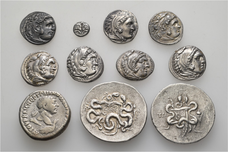 A lot containing 11 silver coins. Including: Greek and Roman Provincial. About v...