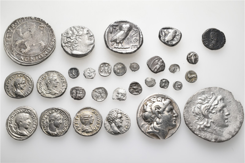 A lot containing 29 silver coins. Including: Greek, Roman Imperial and World. Fi...