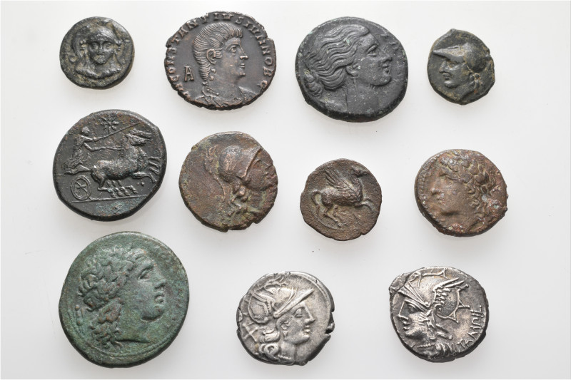 A lot containing 11 silver and bronze coins. Including: Greek, Roman Republican ...