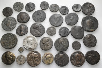 A lot containing 33 silver and bronze coins. All: Roman Provincial. Fine to very fine. Many harshly cleaned. LOT SOLD AS IS, NO RETURNS. 33 coins in l...