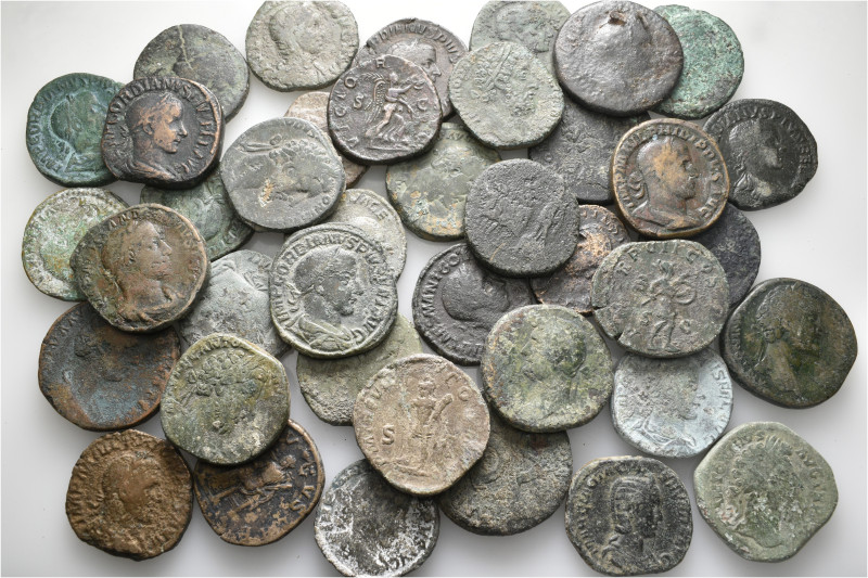 A lot containing 40 bronze coins. All: Roman Imperial. Fair to fine. LOT SOLD AS...