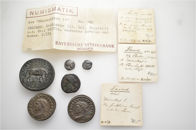 A lot containing 6 silver and bronze coins, with old dealer's tickets. Including...