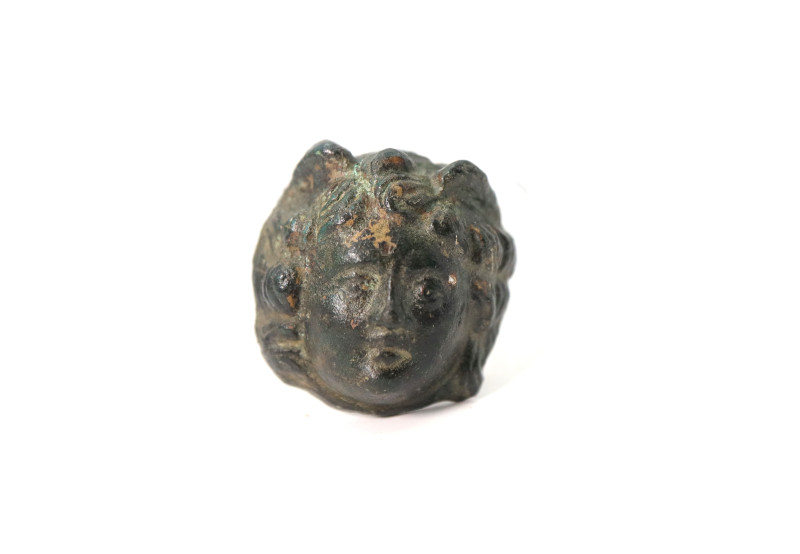 Roman bronze Medusa mask mount; 12.05 grams, 25.70mm. From the collection of a E...