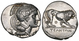 Italy, Lucania, Velia, stater, c. 365-340 BC., helmeted head of Athena right flanked by two small dolphins; Θ behind neck-piece, rev., lion prowling r...