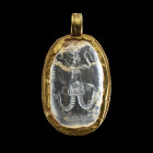 Gold pendant with magical Abraxas gemstone. Middle Roman Imperial Period, 2n - 3rd century AD. Hight with lug 3,9cm and without 3,2cm, width 2,2cm. Ov...