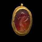 Gemstone in gold depicting Fortuna with cornucopia and palm branch. H gem 1,9cm, total H 2,9cm. Roman, 2nd century A.D.Intact. Gemme mit Goldfassung. ...