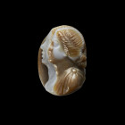 Cameo with two female busts. Middle Roman Imperial Period, 3rd quarter 2nd century AD. 1,7 x 1,1cm. Agate with three layers in light brown, white and ...