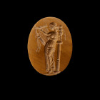 Gemstone with the muse Erato. Late Roman Republic, 2nd - 1st century BC. 1,9 x 1,5cm. Oval intaglio made of ligth brown jasper with slightly convex fr...