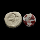 A Greek(?) lentoid stone, red-white breccia, with a goat and a star. 8th / 7th century BC, intact. Lentoid mit Ziege. Griechenland, 8. - 7. Jh. v. Chr...