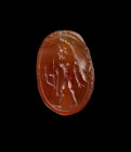 A Greek carnelian scarab, archaic period, late 6th century BC. The underside incised with Heracles holding bow and arrow in linear frame. Part of the ...