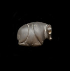 Mesopotamian stamp seal of black serpentine in form of lying calf. Uruk, Jemdet Nasr Period, about 3300 - 2900 BC. 3,2 x 4,6cm. Vertical drilling, fur...