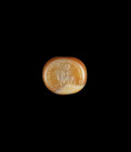 Stamp seal with riding King. Sasanian, 4th - 5th century AD. ø 2,6cm. Round and globular form with transverse drilling, brown to white grained agate. ...