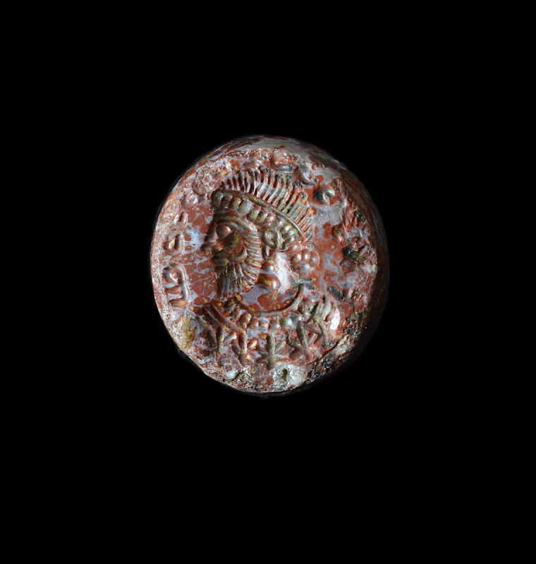 Stamp seal with bust of King. Sasanian, 4th - 5th century AD. ø 2,3cm. Round and...