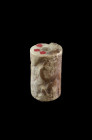 Cylinder seal of bright shell, Akkad I, c. 2334 - 2279 BC. H 3.3cm, ø 2.0cm. A hero protecting two animals from two attacking lions. Fragment on the u...