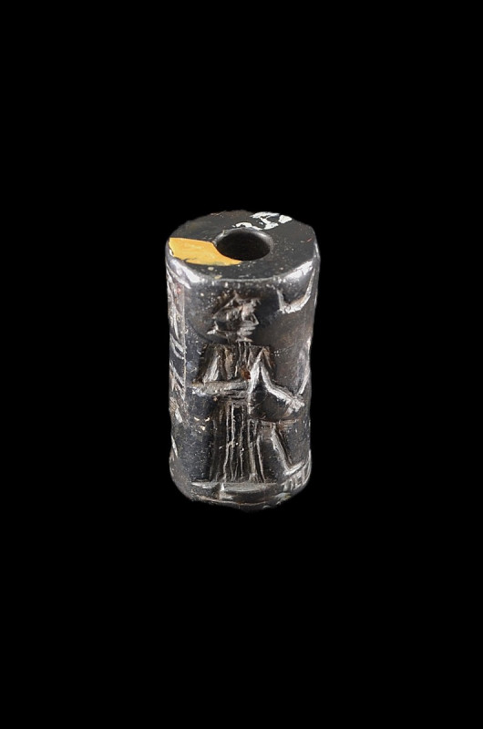 Old Babylonian Period haematite cylinder seal showing the sun god with a saw, pu...