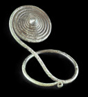 Large bronze arm spiral. Middle European Late Bronze Age, about 800 BC. Height 19,6cm, ø of the spiral 9cm. Full bronze cast. Spiral with movable coni...