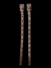 A pair of Chimu wood litter posts, 1000 - 1400 AD, the rectangular shapes pierced with square openings, the interstices carved with spread-wing raptor...