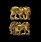 Pair of Ordos bronzes. 3rd - 2nd century BC. Gilded bronze. Embossed bronze belt appliques with two lugs on the backside in form of stylized animals -...