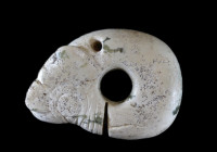 Large Neolithic dragon amulet. Hongshan culture, ca. 4700 - 2900 BC. Length 11cm, width 7,5cm. White jade with green inclusions. Depicted is a coiled ...