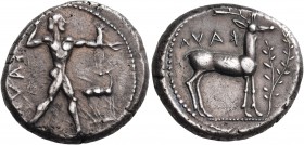 BRUTTIUM. Kaulonia. Circa 475-425 BC. Stater (Silver, 20 mm, 8.07 g, 2 h). ΚΑVΛ Apollo, nude, his hair bound with a taenia, advancing to right, with a...