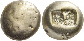 IONIA. Uncertain. Circa 650-600 BC. Trite (Electrum, 10 mm, 4.68 g), Lydo-Milesian standard. Plain globular surface. Rev. Two square incuse punches of...