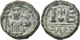 Constans II, 641-668. 12 Nummi (Bronze, 20 mm, 9.71 g, 7 h), possibly overstruck on an Alexandrian potin tetradrachm of the 260s-270s, Alexandria, lat...