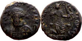 Arcadius (395-408 AD).follis. Obv.: DN ARCADIVS PF AVG; Helmeted, diademed and armored bust of Arcadius, holding a spear on the shoulder and a shield ...