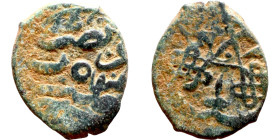 Umayyad/Abbasid. Bronze coin. Obverse: Arabic inscription. Reverse: Arabic inscription

12mm 1.37g