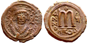Tiberius II Constantine (578-582). Follis. Obverse: mperor, crowned and mantled bust facing, holding mappa and eagle-tipped sceptre, cross above eagle...