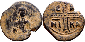 Anonymous Follis attributed to Michael IV(1034-1041). Obverse: +ЄMMA-NOVH Nimbate Christ Antiphonetes standing facing Reverse: Large cross IC-XC / NI-...