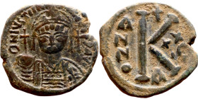 Justinian I. (527-565)Half Follis. Constantinople. Obverse: :D N IVSTINIANVS P P AVG, diademed, helmeted, and cuirassed facing bust holding globus cru...