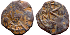 Justinian I. (527-565)Half Follis. Constantinople. Obverse: :D N IVSTINIANVS P P AVG, diademed, helmeted, and cuirassed facing bust holding globus cru...