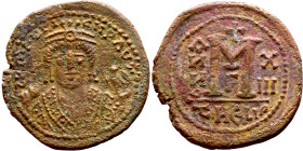 Maurice Tiberius (582-602) Follis. Antioch. Obverse: Crowned bust facing, wearing consular robes, holding mappa and eagle-tipped scepter , Reverse: La...