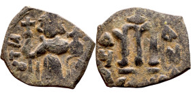 Constans II (641-668) Follis. Obverse: Imperial figure holding cross and globus Reverse: m and inscription

28mm 3.02g