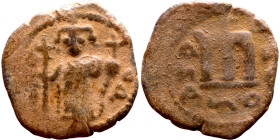 Constans II (641-668) Follis. Obverse: Imperial figure holding cross and globus Reverse: m and inscription

19mm 3.60g

Artificial sand patina
