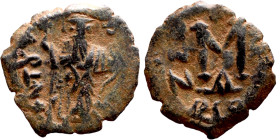 Constans II (641-668) Follis. Obverse: Imperial figure holding cross and globus Reverse: m and inscription

18mm 2.12g