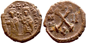 Phocas .(602-610). Decanummium. Obverse: Bust of Phocas and Leonita Reverse: Large X, cross above

16mm 2.77g