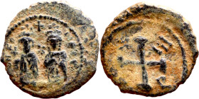 Phocas .(602-610). Decanummium. Obverse: Bust of Phocas and Leonita Reverse: Large X, cross above

17mm 2.42g