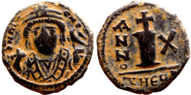 Maurice Tiberius (582-602) Decanummium. Antioch. Obverse: Crowned bust facing, wearing consular robes, holding mappa and eagle-tipped scepter Reverse:...
