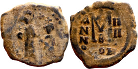 Heraclius and Hercalius. Constantine (610-641) Follis. Obverse: Heraclius on left, Heraclius Constaninte on right, . Reverse: ANNO, Large M, cross abo...
