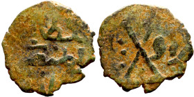 Umayyad/Abbasid. Bronze coin. Obverse: Arabic inscription. Reverse: Arabic inscription

17mm 1.38g