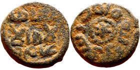 Umayyad/Abbasid. Bronze coin. Obverse: Arabic inscription. Reverse: Arabic inscription

17mm 4.24g
